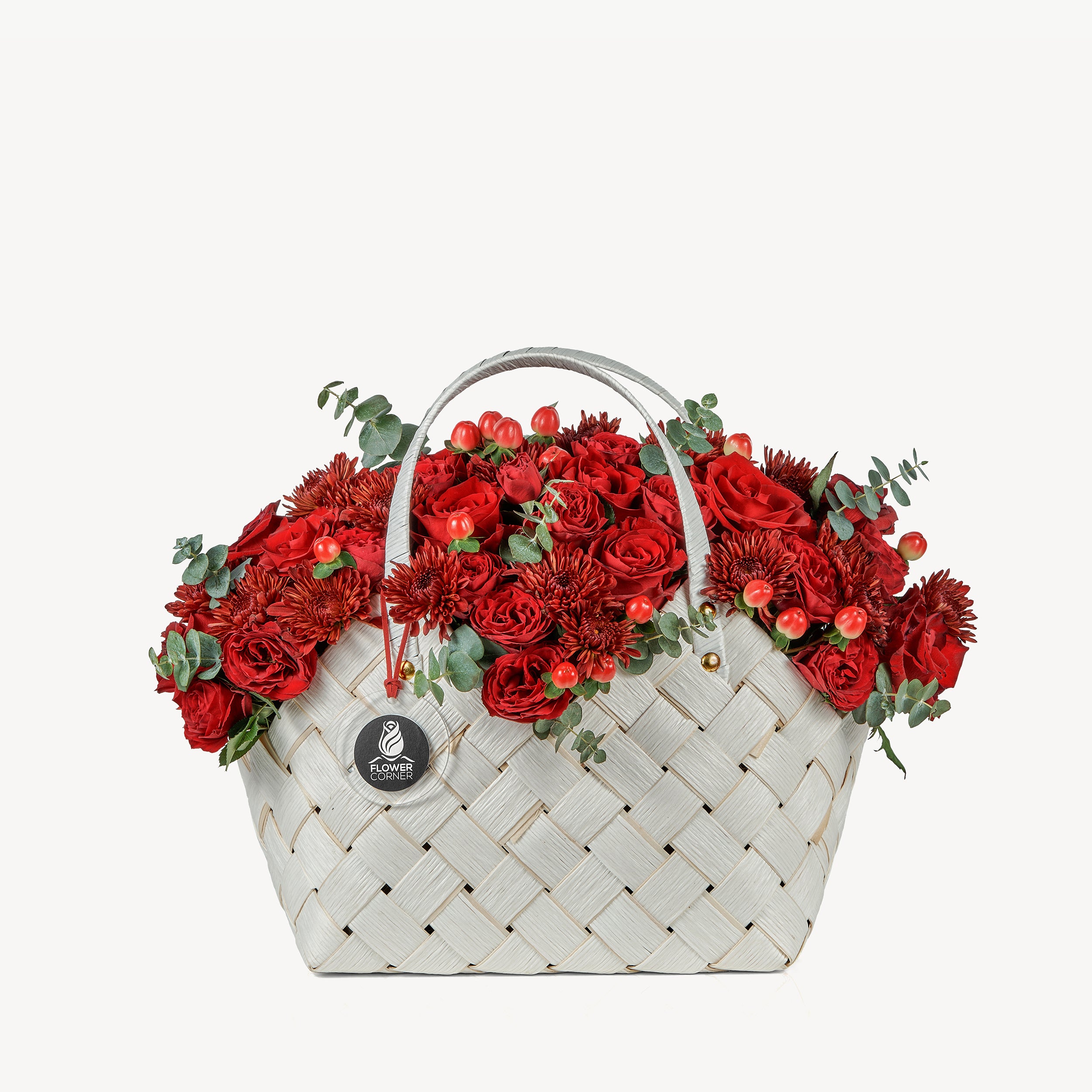 Ruby Romance flower bag with deep red blooms and fresh green accents