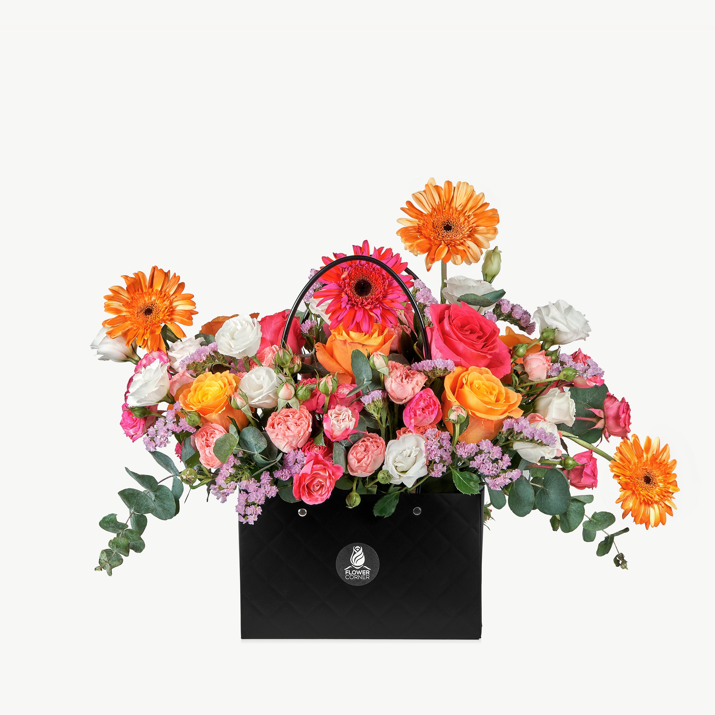 Colorful bouquet of flowers in a black bag with a visible brand