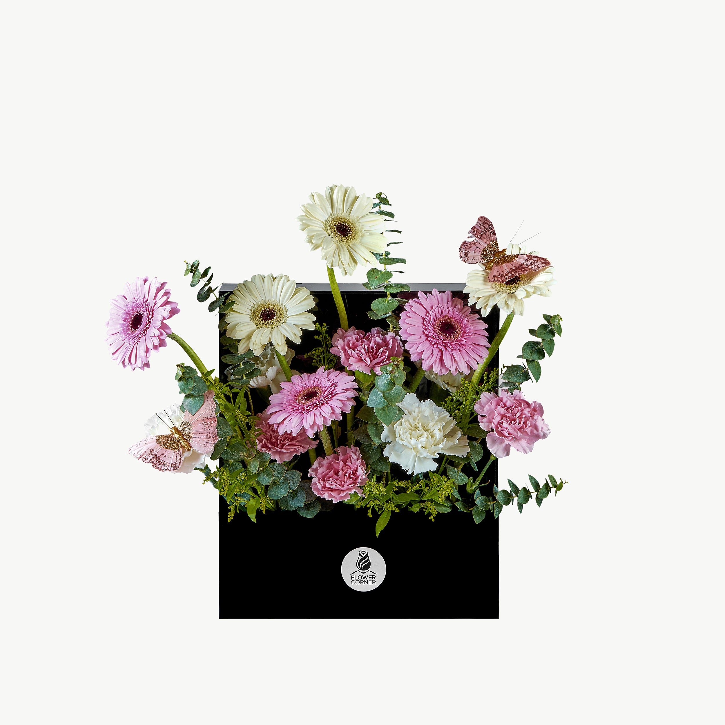 Breeze Flower Window with pink and white gerberas, carnations, eucalyptus, and butterflies in acrylic box