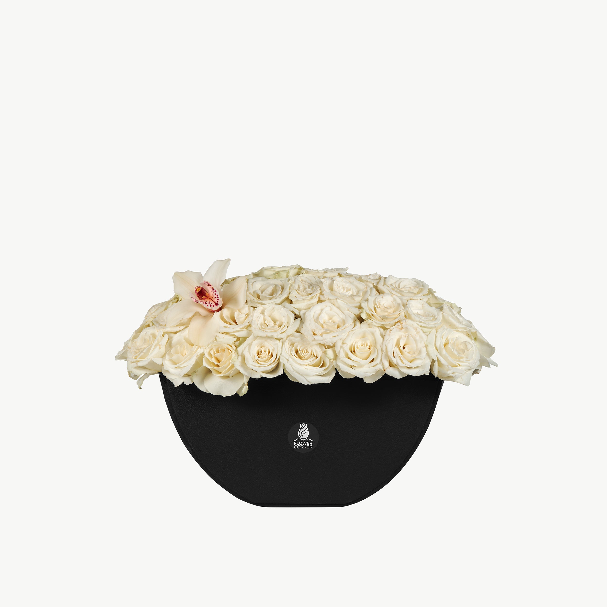 Leather base flower arrangement with white roses and a single white orchid