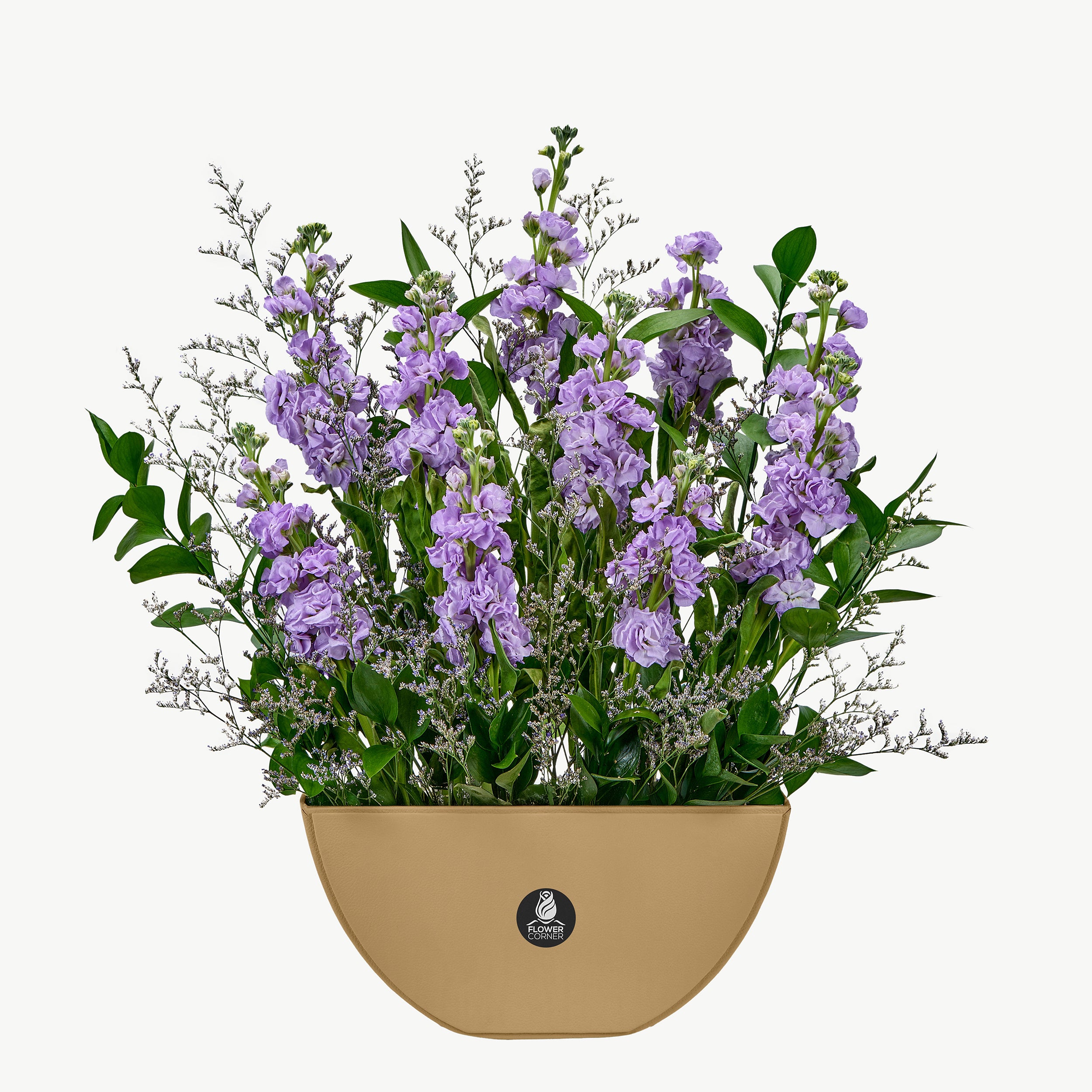 Leather base flower arrangement with vibrant purple Matthiola flowers