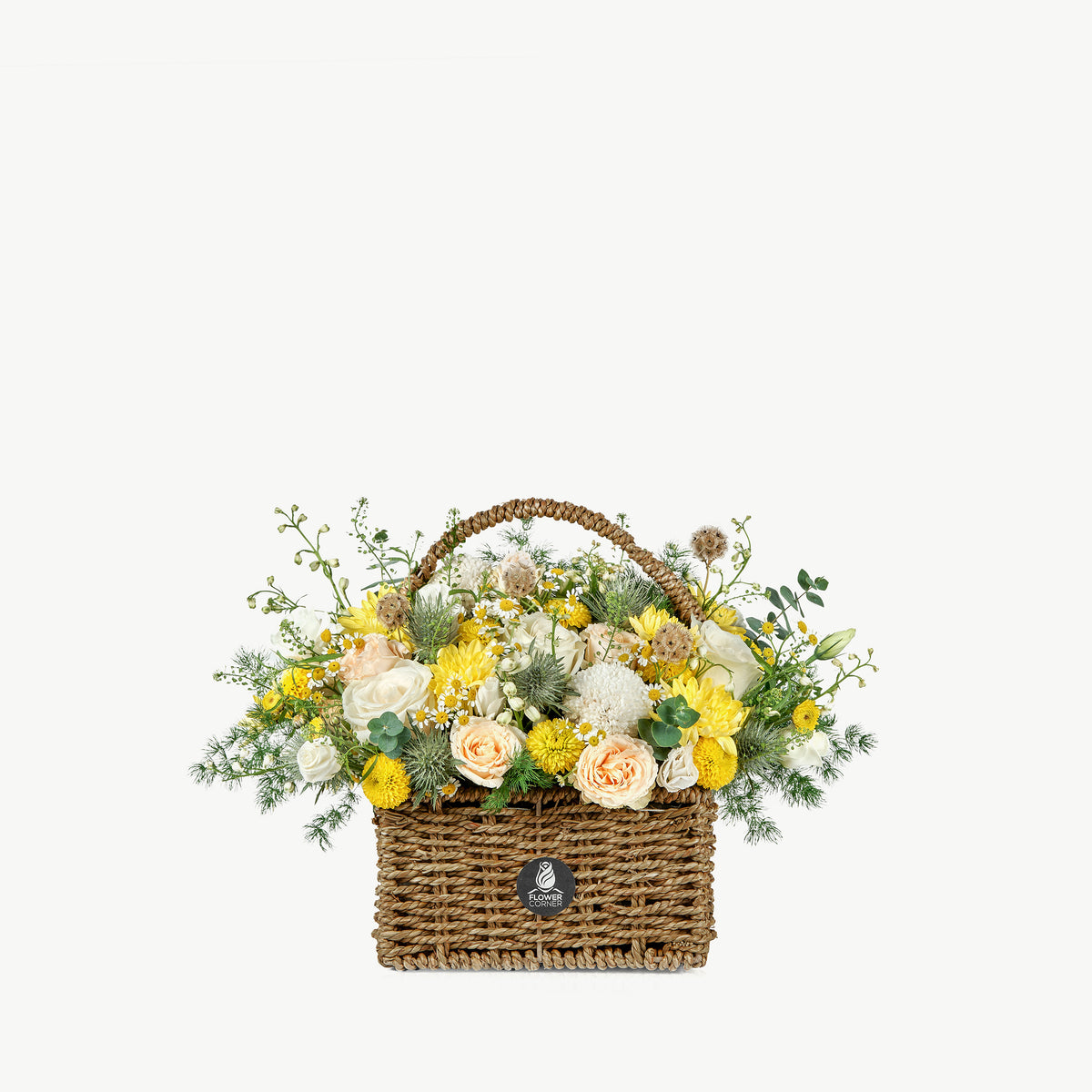 Bloom Bliss flower basket with yellow and peach seasonal flowers and greenery